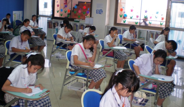 Students taking end of EP term tests in Thailand 